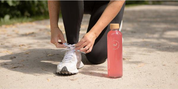 nu3 BCAA Drink dans une gourde en verre nu3 pendant l'entraînement